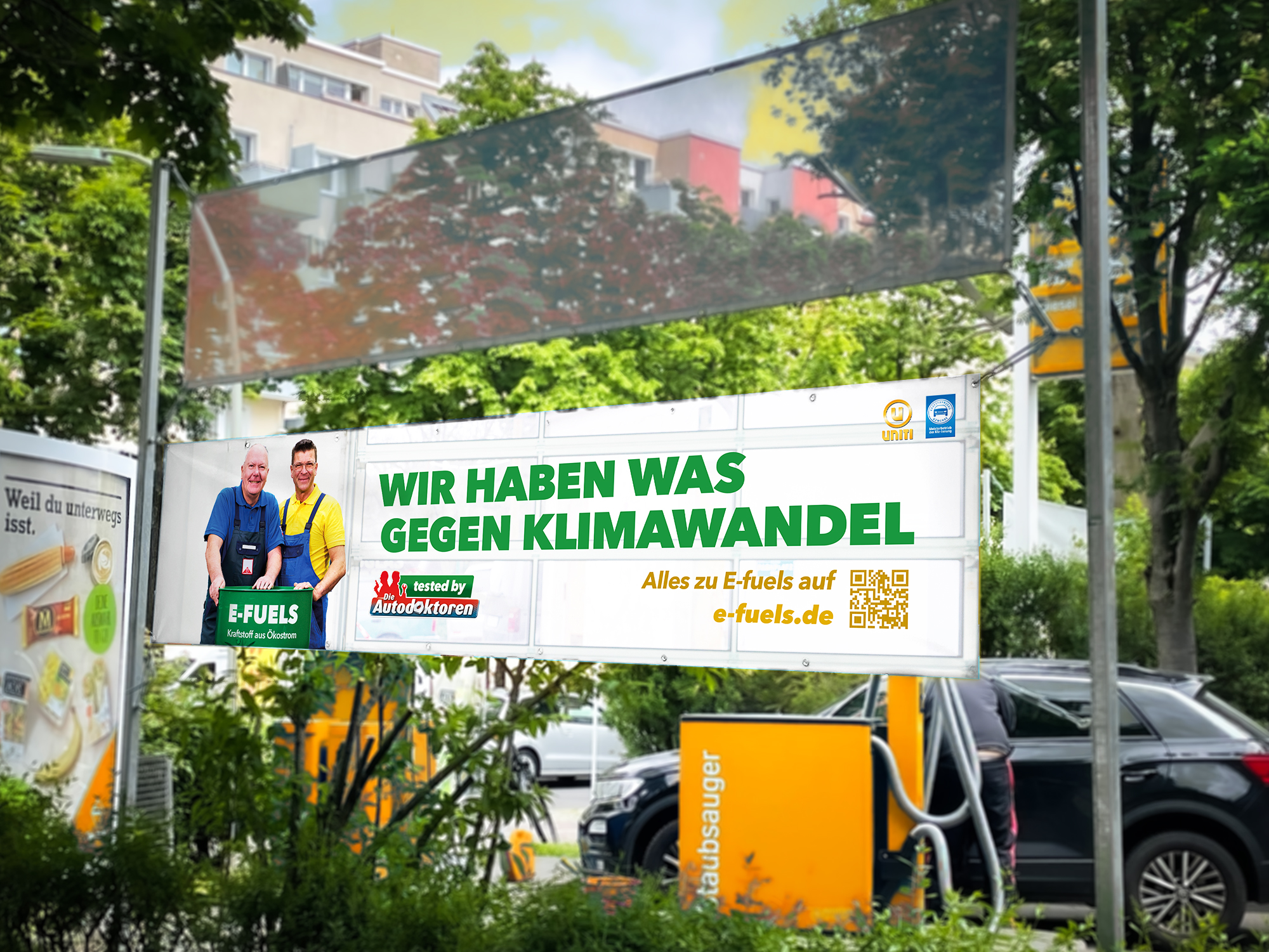 Spannbanner „ Die Autodoktoren tanken E-Fuels“ für Mitglieder